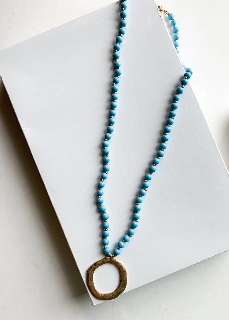 Snug Corner Long Beaded Turquoise Beaded Pendant