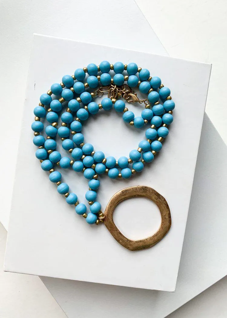 Snug Corner Long Beaded Turquoise Beaded Pendant